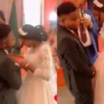 Groom sparks outrage after slapping bride instead of kissing her at the alter (Video)