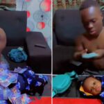 “He go still pack am” – Video trends as Shatta Bandle sprays wads of cash on his newborn