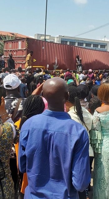 Nine passengers dead as container falls on a bus in Lagos (Video)