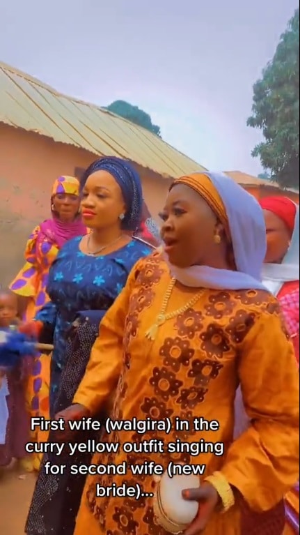 "Peace go dey this home" — Reactions as first wife joyfully welcomes husband's second wife (Video)