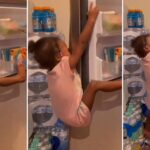 Scary moment a little girl climbed fridge to steal snacks and got stuck (Video)