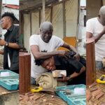 Young man makes his childhood carpenter emotional as he gifts him N200K (Video)