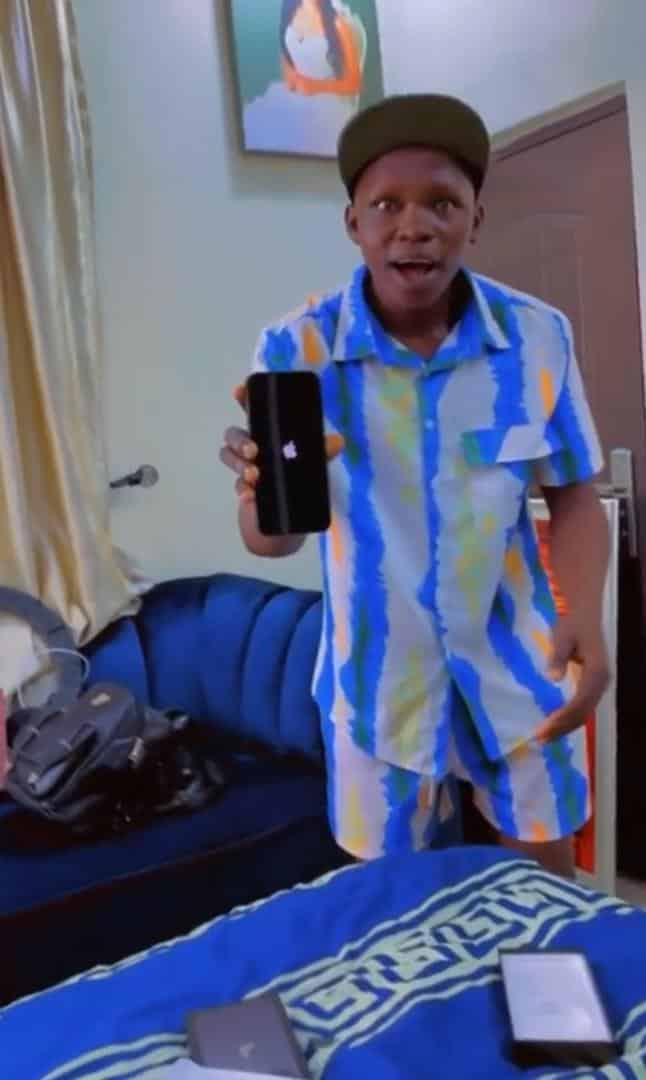 "Leave my son out of this" — Sister screams as overly excited brother reacts to iPhone 13, MacBook gift (Video)