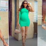 Pregnant mother of 3 catwalks in pencil heels, flaunts baby bump