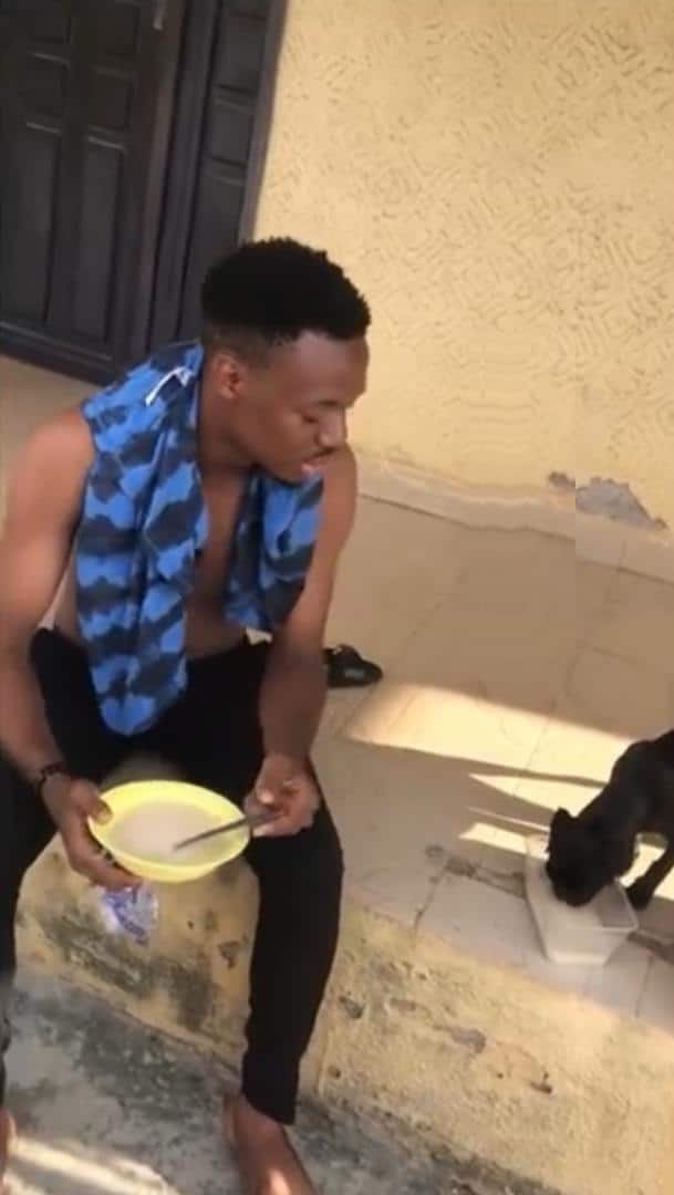 Struggling man appreciates his dog for being understanding and drinking 'garri' with him (Video)