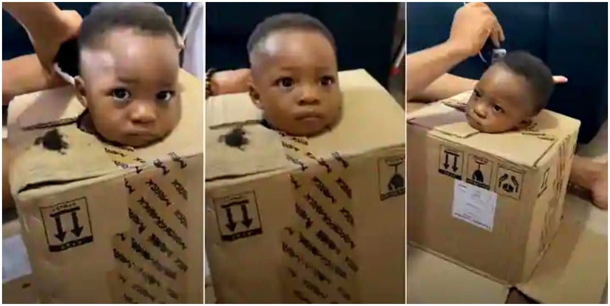 "This pikin no get joy" - Father puts troublesome son inside box to barb his hair