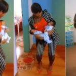 Mother dances with her healthy twin babies after giving birth
