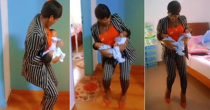 Mother dances with her healthy twin babies after giving birth