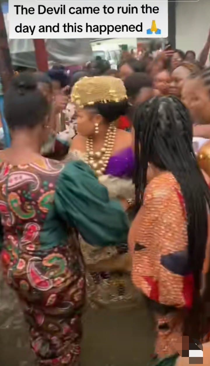 Reactions as bride defies flood to dance with her girls at her wedding