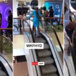 Lady's heel gets trapped on escalator