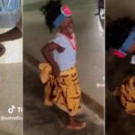 Little girl takes off costume at altar after usher took away mic
