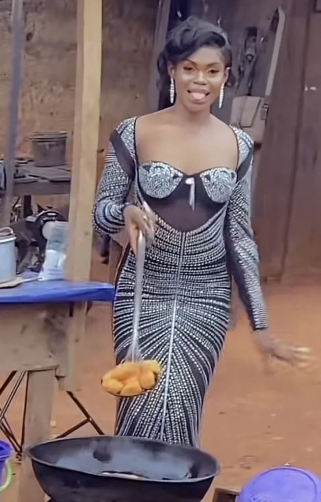 “Akara in grand style” — Reactions as lady wears her best outfit to sell Akara 