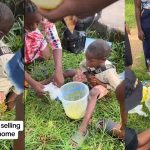 "People are suffering" - Little boy with fever sleeps on road while selling oranges, ladies sit with him, and sell on his behalf