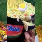 "A master piece"- Talented Nigerian baker wows many with a perfectly baked Indomie Cake